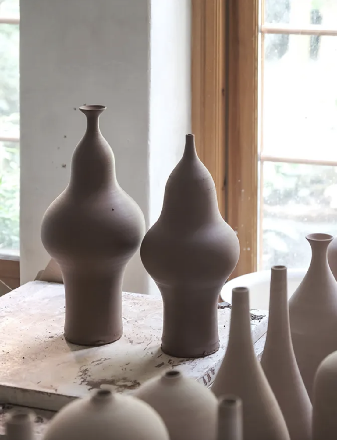 Unfired bottle forms by Eric Landon
